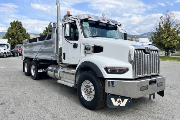 Photo of a white Western Star gravel truck in a parking lot